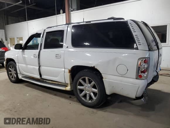 2001 Chevrolet Suburban LT с VIN 3GNFK16T41G112977, выставлен на аукционе Copart как лот 84802615 с пробегом 207 919 миль миль и На запчасти • Non repairable. История ставок и продаж доступна на DreamBid. Изображение 2.