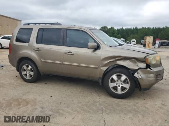 2011 Honda Pilot EX-L z VIN 5FNYF3H61BB055394, wystawiony jako Copart lot #67405285 z przebiegiem 244 804 mil mil oraz Szkoda całkowita • Salvage title. Historia ofert i sprzedaży dostępna na DreamBid. Obrazek 4.