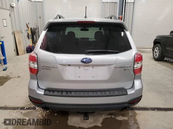 2014 Subaru Forester XT Premium with VIN JF2SJGDC7EH551443, listed as a Copart auction lot 71054875 with 105,734 mi miles and Clean title. Bid and sale history available at DreamBid. Image 6.