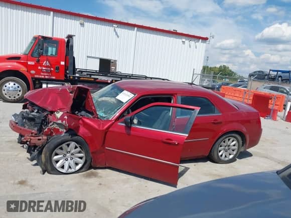 2008 Chrysler 300 LX with VIN 2C3KA43R48H192459, listed as a IAAI auction lot 43113391 with Not provided miles and . Bid and sale history available at DreamBid. Image 13.