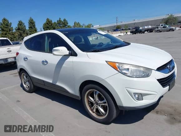 2012 Hyundai Tucson GLS with VIN KM8JU3AC9CU369869, listed as a IAAI auction lot 41997827 with 148,728 mi miles and . Bid and sale history available at DreamBid. Image 1.