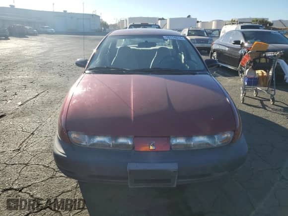 1998 Saturn SL с VIN 1G8ZH5283WZ112435, выставлен на аукционе Copart как лот 76774074 с пробегом 24 647 миль миль и Чистый • Clean title. История ставок и продаж доступна на DreamBid. Изображение 5.