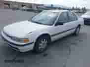 1990 Honda Accord LX with VIN JHMCB7652LC067333, listed as a IAAI auction lot 42580921 with 119,733 mi miles and . Bid and sale history available at DreamBid. Image 2.