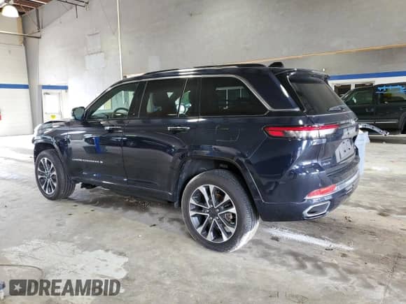 2023 Jeep Grand Cherokee Overland z VIN 1C4RJHDG0P8847994, wystawiony jako Copart lot #60924405 z przebiegiem 18 606 mil mil oraz Szkoda całkowita • Salvage title. Historia ofert i sprzedaży dostępna na DreamBid. Obrazek 2.