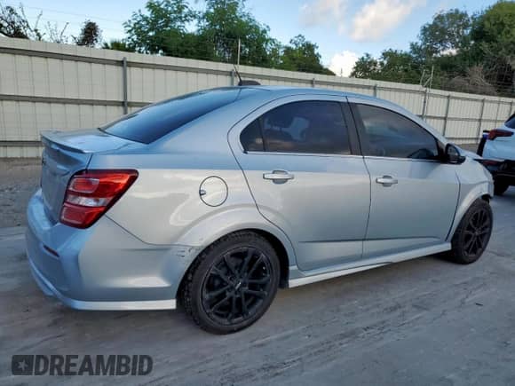 2018 Chevrolet Sonic LT with VIN 1G1JD5SB4J4133870, listed as a Copart auction lot 81517855 with 76,327 mi miles and Salvage title. Bid and sale history available at DreamBid. Image 3.
