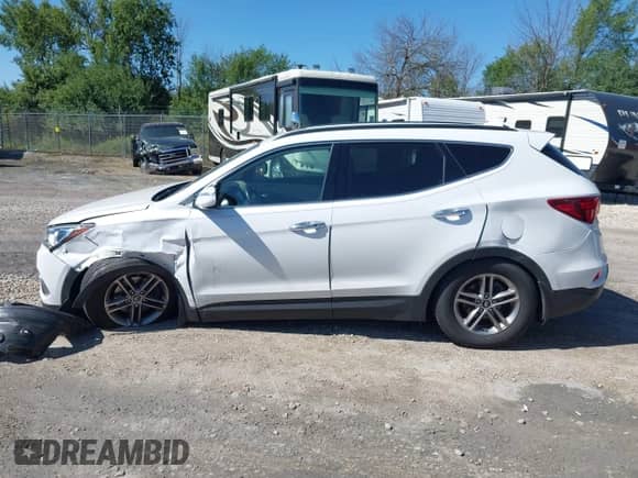 2017 Hyundai Santa Fe 2.4L z VIN 5NMZUDLB3HH029892, wystawiony jako IAAI lot #43049357 z przebiegiem 107 077 mil mil oraz . Historia ofert i sprzedaży dostępna na DreamBid. Obrazek 14.