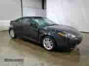 2008 Hyundai Tiburon GS with VIN KMHHM66D48U265282, listed as a Copart auction lot 77391204 with 77,088 mi miles and Salvage title. Bid and sale history available at DreamBid. Image 4.