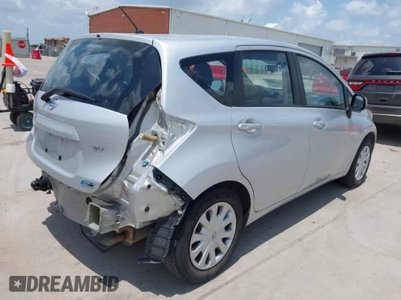 2014 Nissan Note SV with VIN 3N1CE2CP6EL418787, listed as a IAAI auction lot 42540009 with 99,508 mi miles and . Bid and sale history available at DreamBid. Image 4.