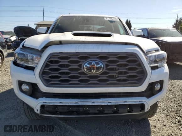 2022 Toyota Tacoma SR с VIN 3TMCZ5AN1NM504958, выставлен на аукционе Copart как лот 81156135 с пробегом 26 327 миль миль и Списание • Salvage title. История ставок и продаж доступна на DreamBid. Изображение 5.