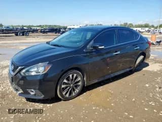 2017 Nissan Sentra S z VIN 3N1AB7AP1HY252699, wystawiony jako Copart lot #84208085 z przebiegiem 167 775 mil mil oraz Szkoda całkowita • Salvage title. Historia ofert i sprzedaży dostępna na DreamBid. Obrazek 1.