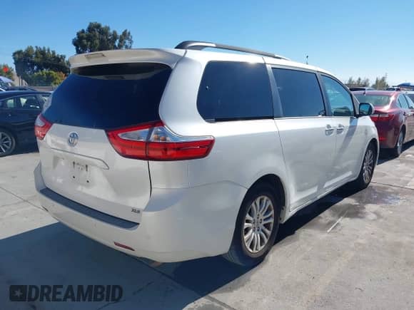 2015 Toyota Sienna XLE with VIN 5TDYK3DC3FS676841, listed as a IAAI auction lot 43497816 with 181,180 mi miles and . Bid and sale history available at DreamBid. Image 4.