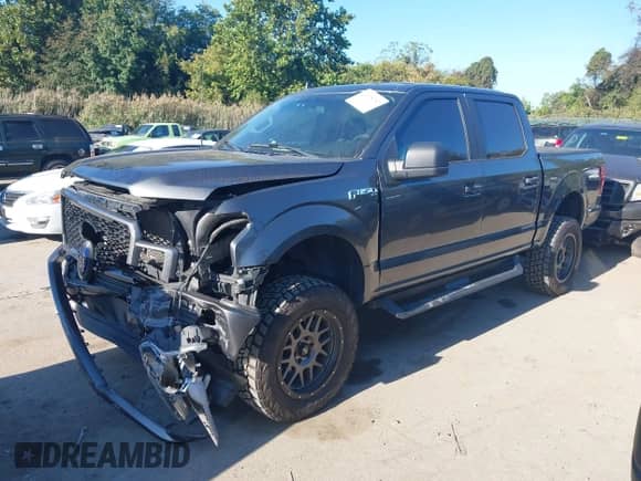 2020 Ford F-150 XLT with VIN 1FTEW1E53LFC30261, listed as a IAAI auction lot 43365752 with 125,373 mi miles and . Bid and sale history available at DreamBid. Image 17.