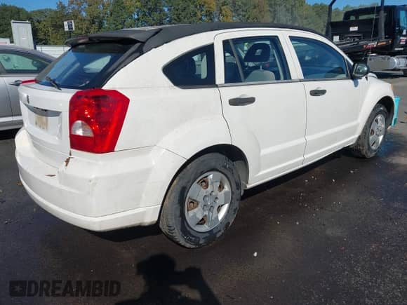 2007 Dodge Caliber with VIN 1B3JB28B27D504828, listed as a IAAI auction lot 43444034 with Not provided miles and . Bid and sale history available at DreamBid. Image 4.