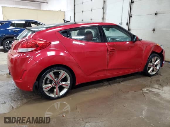 2012 Hyundai Veloster w/Black Int z VIN KMHTC6AD3CU049324, wystawiony jako Copart lot #85596195 z przebiegiem 171 178 mil mil oraz Szkoda całkowita • Salvage title. Historia ofert i sprzedaży dostępna na DreamBid. Obrazek 3.