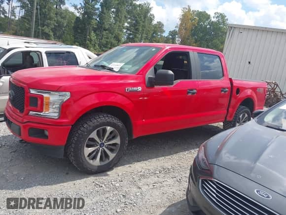 2019 Ford F-150 XLT with VIN 1FTEW1EP1KFC95092, listed as a IAAI auction lot 43116814 with 92,768 mi miles and . Bid and sale history available at DreamBid. Image 14.