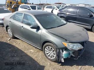 2014 Toyota Camry LE с VIN 4T1BD1FK5EU101977, выставлен на аукционе IAAI как лот 42007286 с пробегом 181 027 миль миль и . История ставок и продаж доступна на DreamBid. Изображение 1.