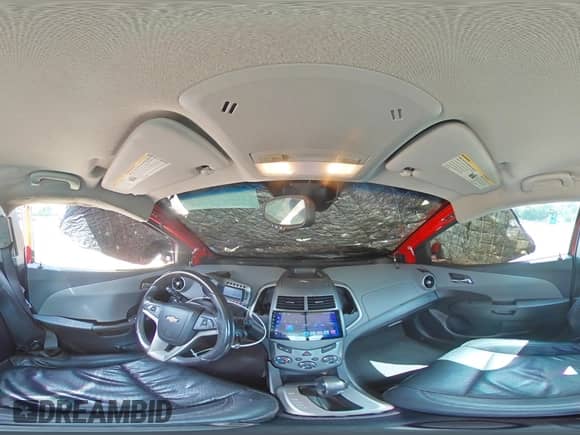 2015 Chevrolet Sonic LTZ z VIN 1G1JE6SBXF4106716, wystawiony jako Copart lot #64410075 z przebiegiem 103 001 mil mil oraz Szkoda całkowita • Salvage title. Historia ofert i sprzedaży dostępna na DreamBid. Obrazek 14.
