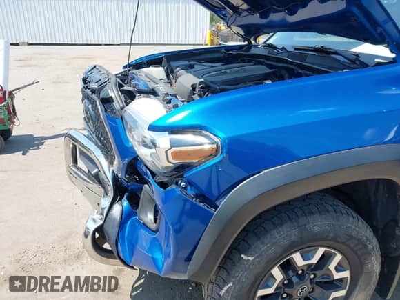 2018 Toyota Tacoma SR z VIN 3TMCZ5AN0JM126724, wystawiony jako IAAI lot #42842788 z przebiegiem 91 776 mil mil oraz . Historia ofert i sprzedaży dostępna na DreamBid. Obrazek 6.
