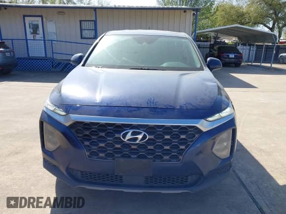 2020 Hyundai Santa Fe SE with VIN 5NMS23AD0LH141404, listed as a IAAI auction lot 41870350 with 144,109 mi miles and . Bid and sale history available at DreamBid. Image 13.