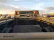 2002 Ford F-150 XL z VIN 1FTRF18262NB35586, wystawiony jako Copart lot #77114114 z przebiegiem 166 942 mil mil oraz Szkoda całkowita • Salvage title. Historia ofert i sprzedaży dostępna na DreamBid. Obrazek 10.