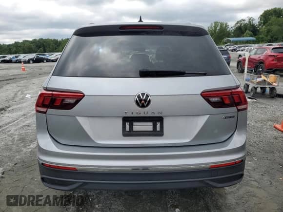 2022 Volkswagen Tiguan S с VIN 3VV0B7AX2NM141267, выставлен на аукционе Copart как лот 67865815 с пробегом 64 146 миль миль и Списание • Salvage title. История ставок и продаж доступна на DreamBid. Изображение 6.