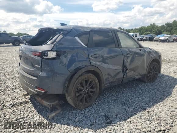 2022 Mazda CX-5 S Carbon Edition z VIN JM3KFBCM6N0612333, wystawiony jako Copart lot #66183515 z przebiegiem Nie podano mil oraz Szkoda całkowita • Salvage title. Historia ofert i sprzedaży dostępna na DreamBid. Obrazek 3.