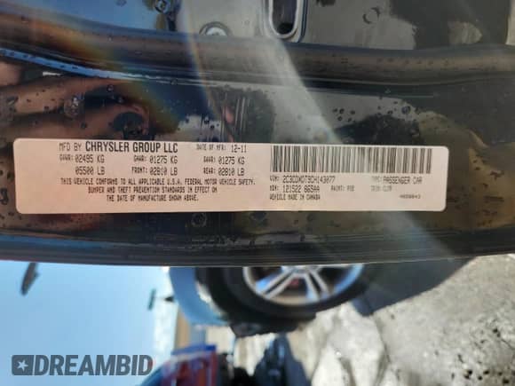 2012 Dodge Charger RT Max with VIN 2C3CDXDT9CH143077, listed as a Copart auction lot 82132095 with 153,773 mi miles and Salvage title. Bid and sale history available at DreamBid. Image 12.