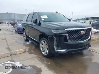 2023 Cadillac Escalade 4WD Premium Luxury with VIN 1GYS4BKL8PR156447, listed as a IAAI auction lot 40232356 with 44,065 mi miles and . Bid and sale history available at DreamBid. Image 1.