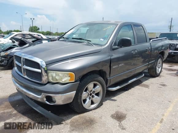 2003 Dodge 1500 ST with VIN 1D7HA18N23J596951, listed as a IAAI auction lot 42724060 with 249,805 mi miles and . Bid and sale history available at DreamBid. Image 2.