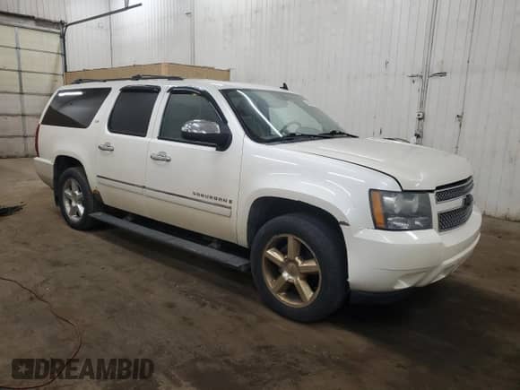 2009 Chevrolet Suburban with VIN 1GNFK36Y49R290505, listed as a Copart auction lot 43282705 with 290,630 mi miles and Clean title. Bid and sale history available at DreamBid. Image 4.