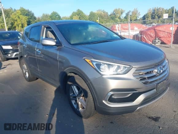 2017 Hyundai Santa Fe 2.4L z VIN 5XYZTDLBXHG441059, wystawiony jako IAAI lot #43284375 z przebiegiem 130 841 mil mil oraz . Historia ofert i sprzedaży dostępna na DreamBid. Obrazek 1.