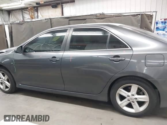 2012 Toyota Camry L z VIN 4T1BF1FK1CU185738, wystawiony jako IAAI lot #43101209 z przebiegiem 190 535 mil mil oraz . Historia ofert i sprzedaży dostępna na DreamBid. Obrazek 14.