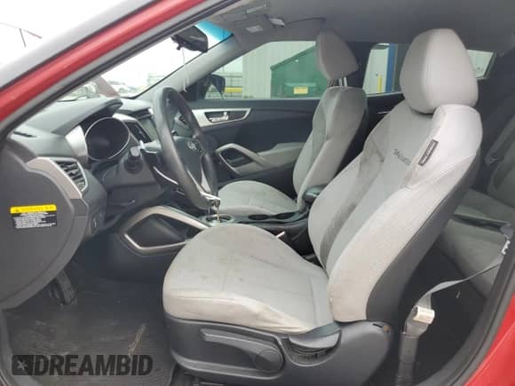 2013 Hyundai Veloster w/Black Int с VIN KMHTC6AD9DU093846, выставлен на аукционе Copart как лот 59692295 с пробегом 179 707 миль миль и Списание • Salvage title. История ставок и продаж доступна на DreamBid. Изображение 7.