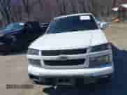 2012 Chevrolet Colorado Work Truck z VIN 1GCJTBFE8C8165200, wystawiony jako IAAI lot #41900797 z przebiegiem 101 023 mil mil oraz . Historia ofert i sprzedaży dostępna na DreamBid. Obrazek 12.