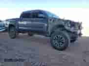 2020 Toyota Tacoma TRD Off Road с VIN 5TFCZ5AN0LX220213, выставлен на аукционе Copart как лот 82211705 с пробегом 72 977 миль миль и Списание • Salvage title. История ставок и продаж доступна на DreamBid. Изображение 4.