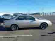 1998 Toyota Camry LE with VIN JT2BG22K3W0151088, listed as a IAAI auction lot 41429977 with 435,394 mi miles and . Bid and sale history available at DreamBid. Image 13.