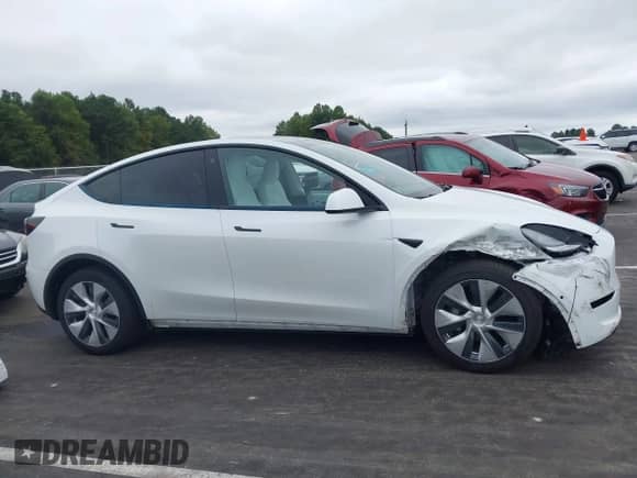 2022 Tesla Model Y Long Range z VIN 7SAYGDEE6NF317707, wystawiony jako IAAI lot #43186532 z przebiegiem 45 306 mil mil oraz . Historia ofert i sprzedaży dostępna na DreamBid. Obrazek 14.