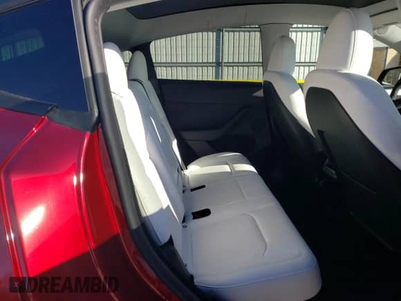 2024 Tesla Model Y Long Range with VIN 7SAYGDEE3RA247294, listed as a Copart auction lot 86489084 with 9,753 mi miles and Salvage title. Bid and sale history available at DreamBid. Image 11.