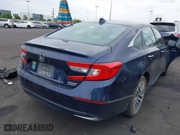2020 Honda Accord Touring with VIN 1HGCV3F96LA017150, listed as a IAAI auction lot 43105011 with 114,871 mi miles and . Bid and sale history available at DreamBid. Image 4.