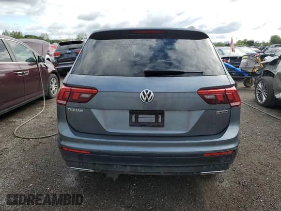 2019 Volkswagen Tiguan S с VIN 3VV0B7AX8KM166069, выставлен на аукционе Copart как лот 70216185 с пробегом 90 250 миль миль и Списание • Salvage title. История ставок и продаж доступна на DreamBid. Изображение 6.