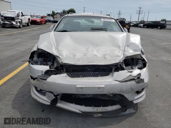 2006 Hyundai Tiburon GS с VIN KMHHM65D86U212227, выставлен на аукционе Copart как лот 59633855 с пробегом Не указан миль и Списание • Salvage title. История ставок и продаж доступна на DreamBid. Изображение 5.