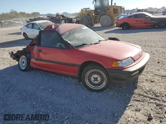 1990 Honda Civic with VIN 2HGED6344LH564439, listed as a Copart auction lot 77142714 with 157,214 mi miles and Salvage title. Bid and sale history available at DreamBid. Image 4.