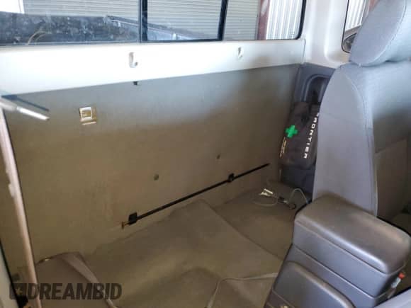 2003 Nissan Frontier XE z VIN 1N6ED26Y43C421206, wystawiony jako Copart lot #42264105 z przebiegiem 117 879 mil mil oraz Szkoda całkowita • Salvage title. Historia ofert i sprzedaży dostępna na DreamBid. Obrazek 10.