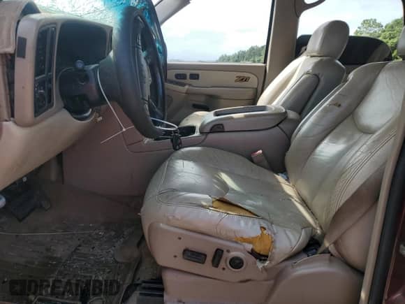 2003 Chevrolet Tahoe Z71 z VIN 1GNEK13Z23R303725, wystawiony jako Copart lot #83854395 z przebiegiem Nie podano mil oraz Szkoda całkowita • Salvage title. Historia ofert i sprzedaży dostępna na DreamBid. Obrazek 7.