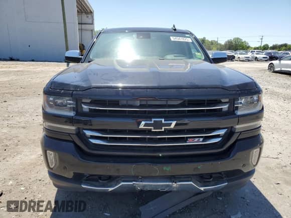 2017 Chevrolet Silverado 1500 LTZ with VIN 1GCVKSEC5HZ149848, listed as a Copart auction lot 54541825 with 104,291 mi miles and Salvage title. Bid and sale history available at DreamBid. Image 5.