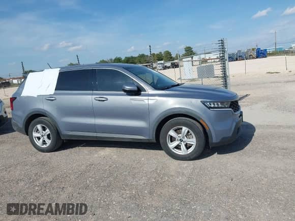2023 Kia Sorento LX with VIN 5XYRG4LC7PG178699, listed as a IAAI auction lot 42729158 with 60,843 mi miles and . Bid and sale history available at DreamBid. Image 14.