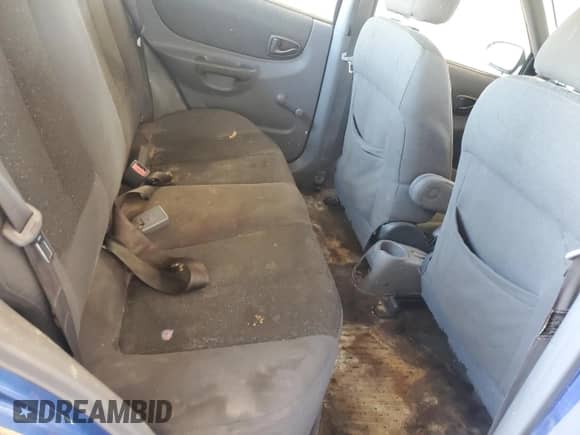 2000 Hyundai Accent z VIN KMHCG45G6YU066218, wystawiony jako Copart lot #84948715 z przebiegiem 110 059 mil mil oraz Szkoda całkowita • Salvage title. Historia ofert i sprzedaży dostępna na DreamBid. Obrazek 10.