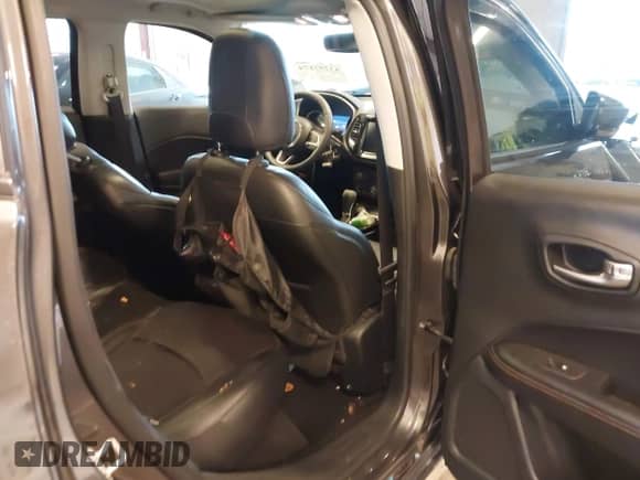 2019 Jeep Compass Limited with VIN 3C4NJDCB1KT780880, listed as a IAAI auction lot 43297174 with 76,843 mi miles and . Bid and sale history available at DreamBid. Image 8.