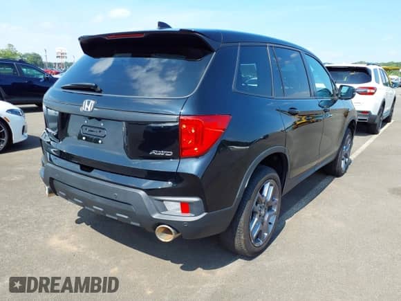 2023 Honda Passport EX-L with VIN 5FNYF8H51PB009494, listed as a IAAI auction lot 42751895 with 24,085 mi miles and . Bid and sale history available at DreamBid. Image 4.
