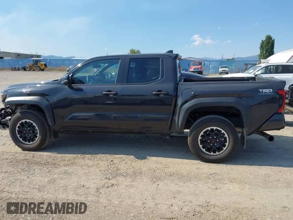 2024 Toyota Tacoma TRD Off Road with VIN 3TMLB5JN7RM069938, listed as a IAAI auction lot 43056789 with 6,837 mi miles and . Bid and sale history available at DreamBid. Image 14.